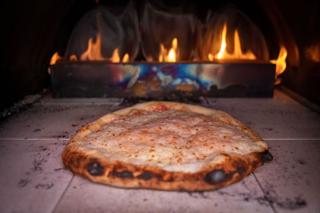 Charred, bubbly crust straight from the fire