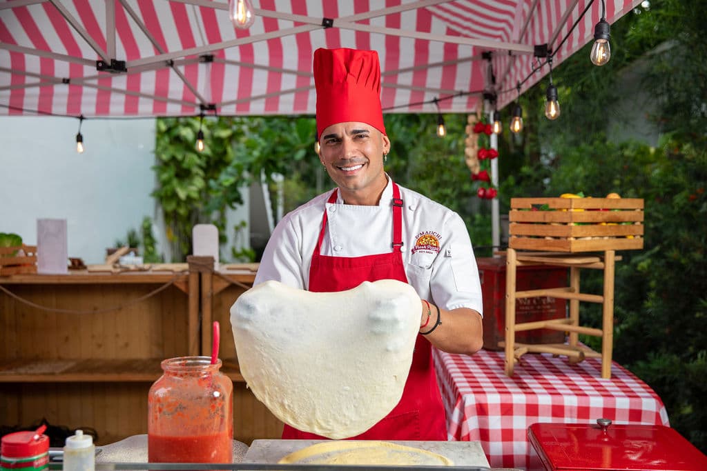 A slice of wood-fired pizza ready to serve