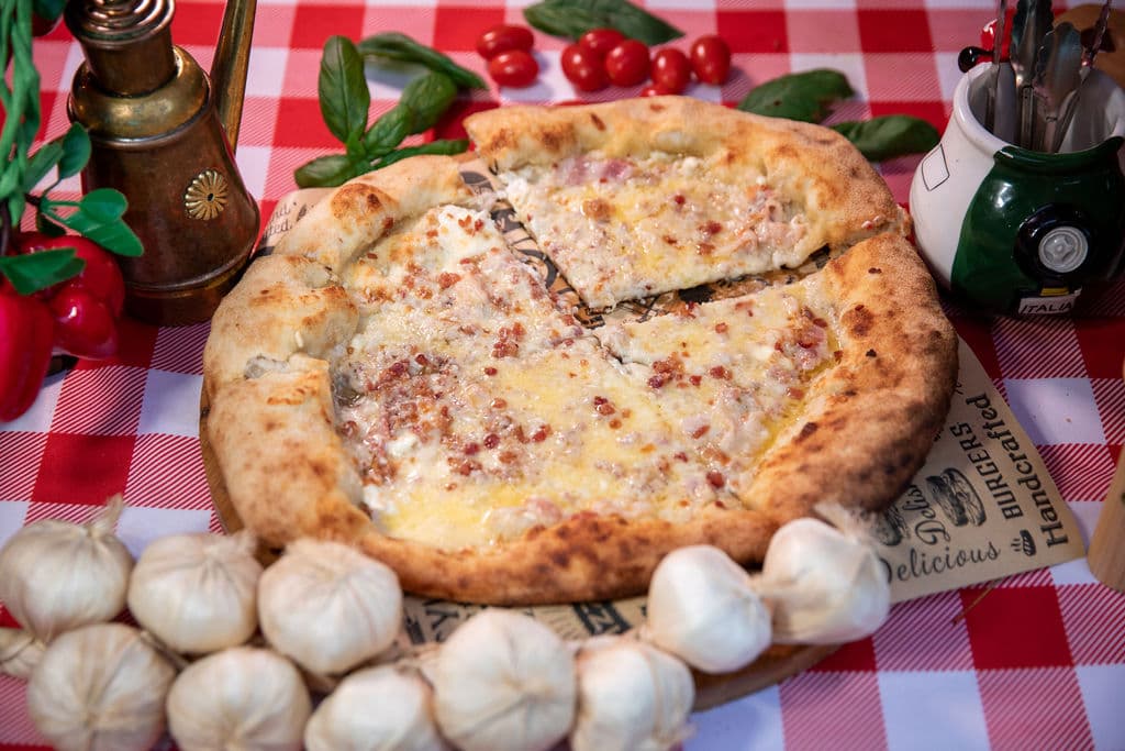 D' Mauchi Fresh Pizza serving a private party