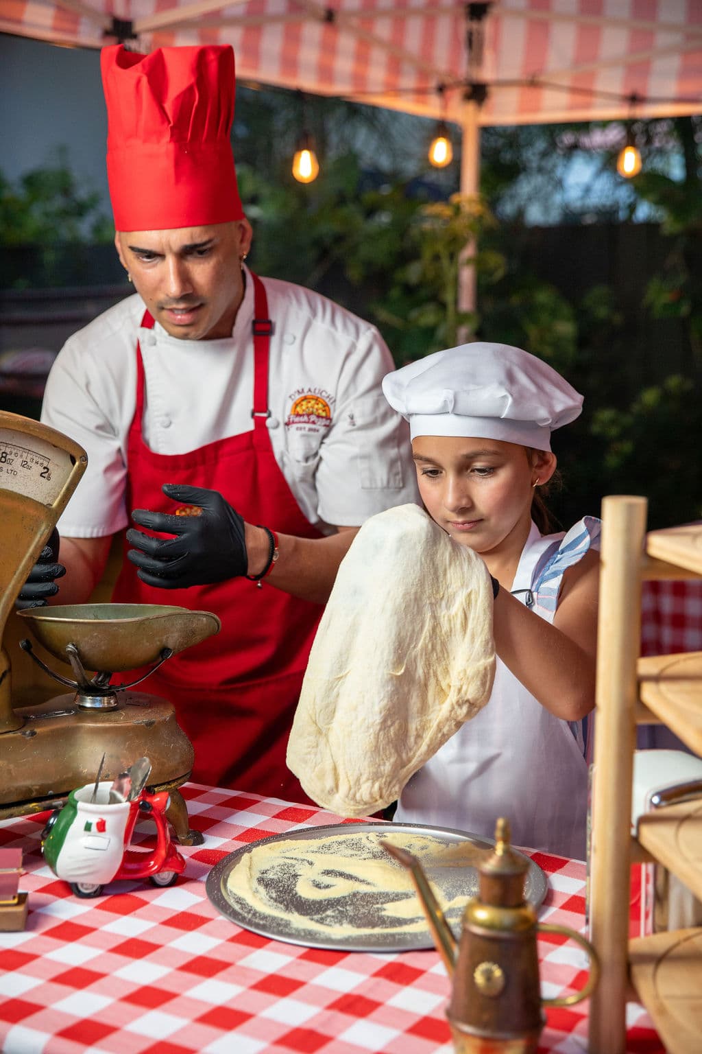 Wood-fired pizza served live at a Miami event