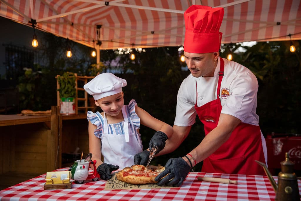 Kids pizza masterclass in action