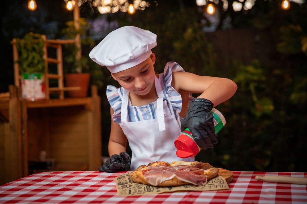 Wood-fired pizza served live at a Miami event